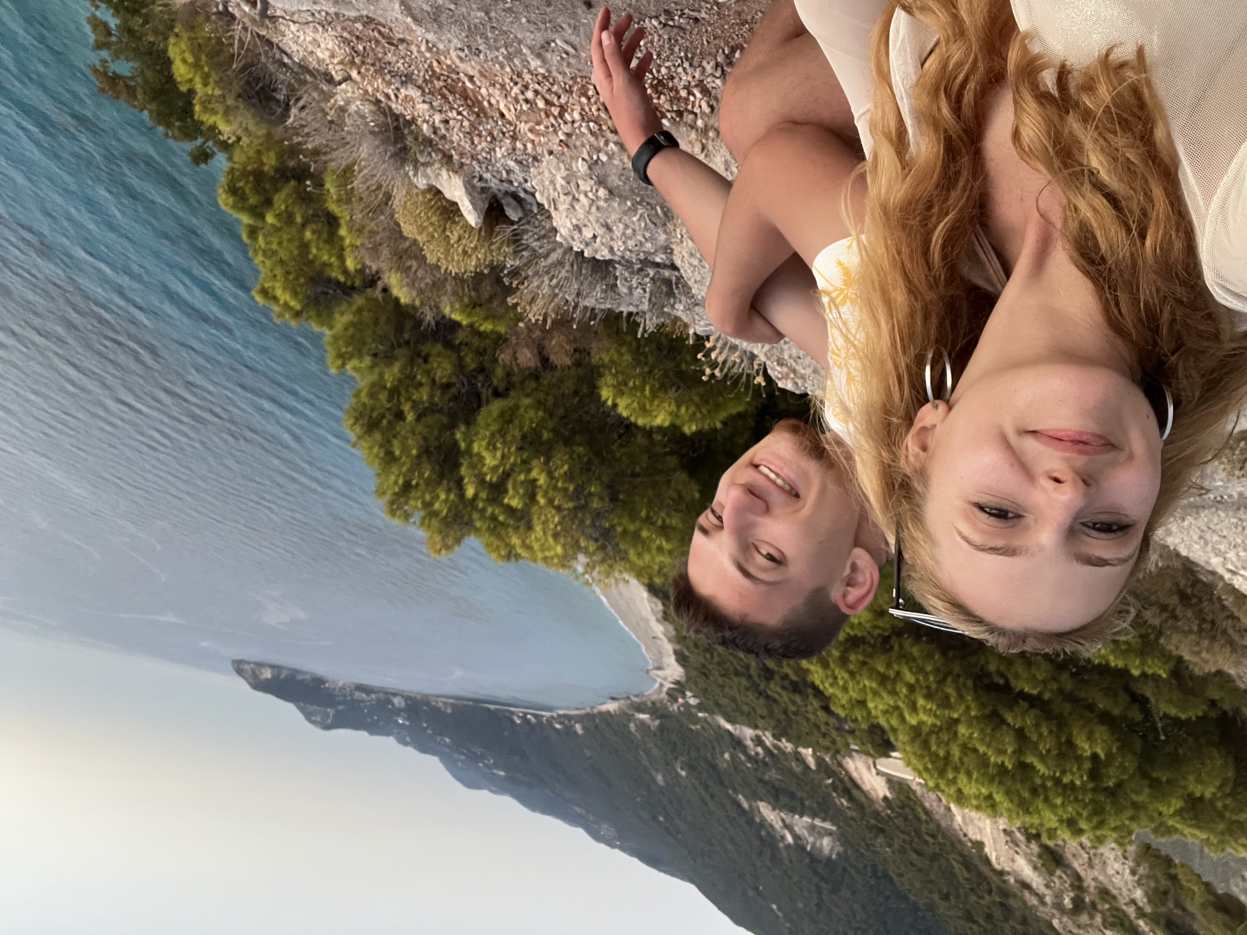 Christina and Martin overlooking a coastline